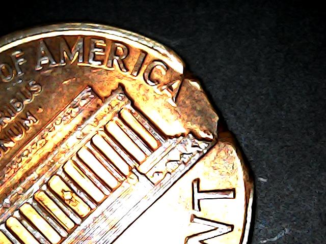 Four-Clipped-Planchets-Found-In-Bank-Rolls
