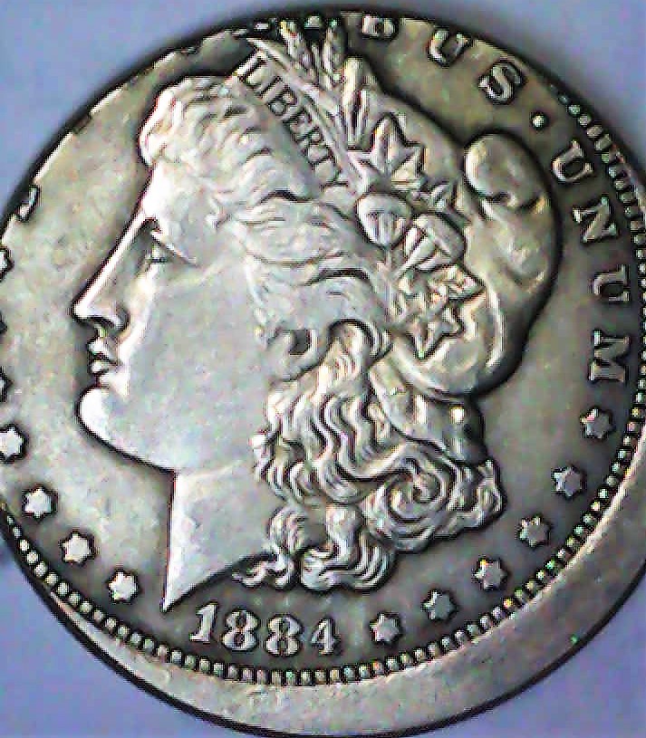 1884-O-Morgan-Silver-Dollar-Off-Center.loser.