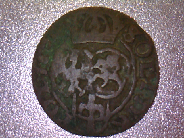 Who-Put-This-Crowned-S-On-A-Coin?