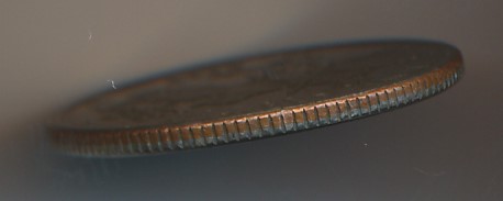 Different-States-On-Each-Side-Of-A-Quarter.
