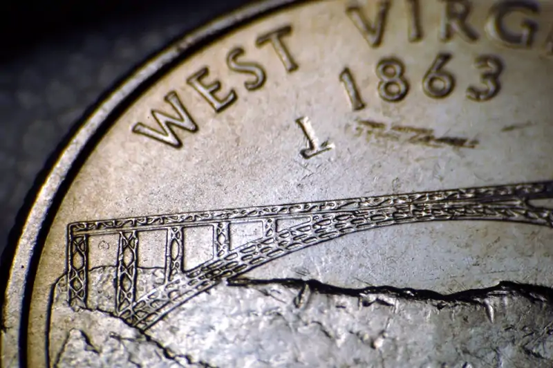 Dropped-Letter-On-A-2005-West-Virginia-Quarter---Extremely-Bold