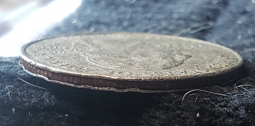 1967-Dime-That-Weighs-2.00-Grams-And-Looking-At-Reeded-Edge-You-Can-See-The-Layers-