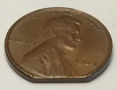 1969-Lincoln-Memorial-Cent---Clipped-Planchet-Or-PMD?