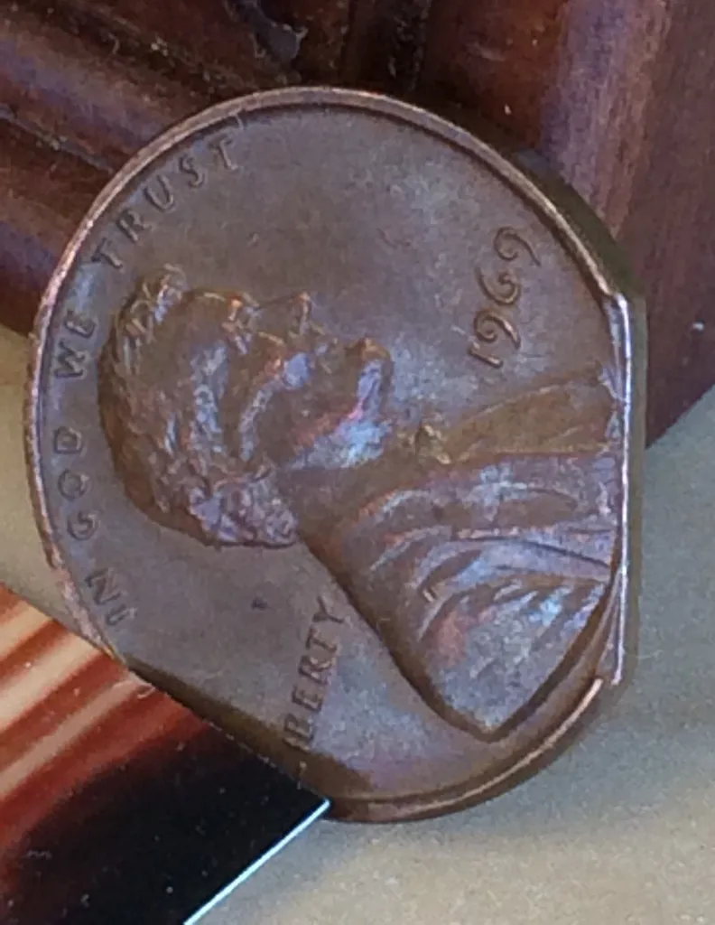 1969-Lincoln-Memorial-Cent---Clipped-Planchet-Or-PMD?