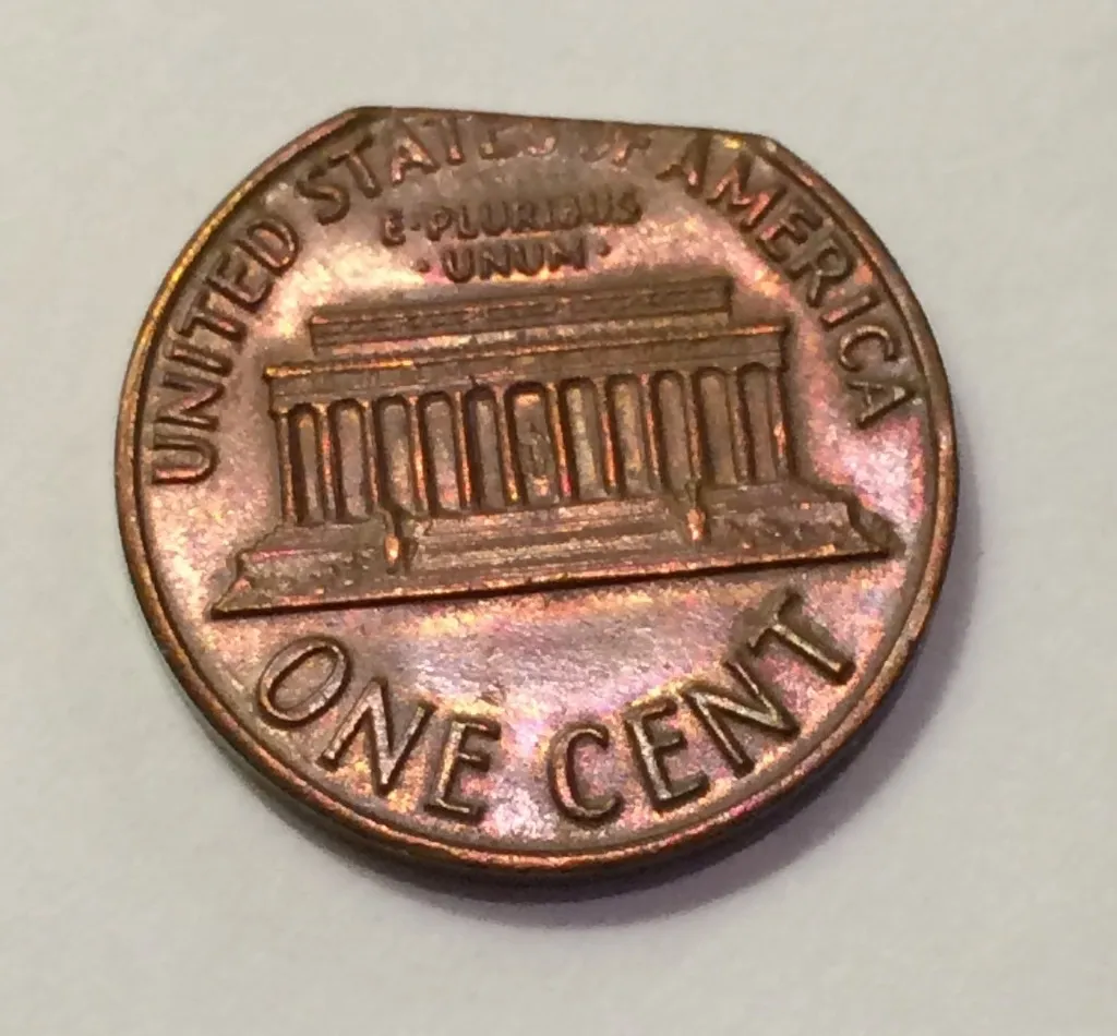 1969-Lincoln-Memorial-Cent---Clipped-Planchet-Or-PMD?