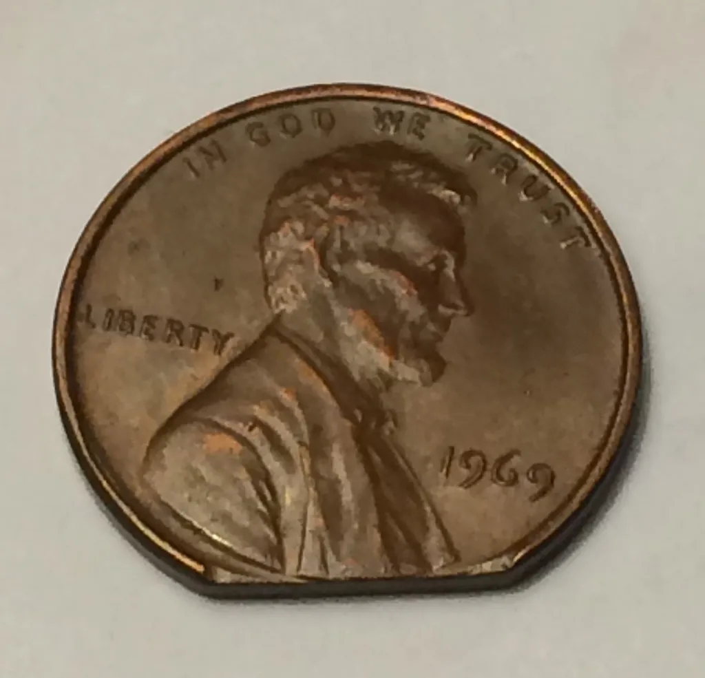 1969-Lincoln-Memorial-Cent---Clipped-Planchet-Or-PMD?