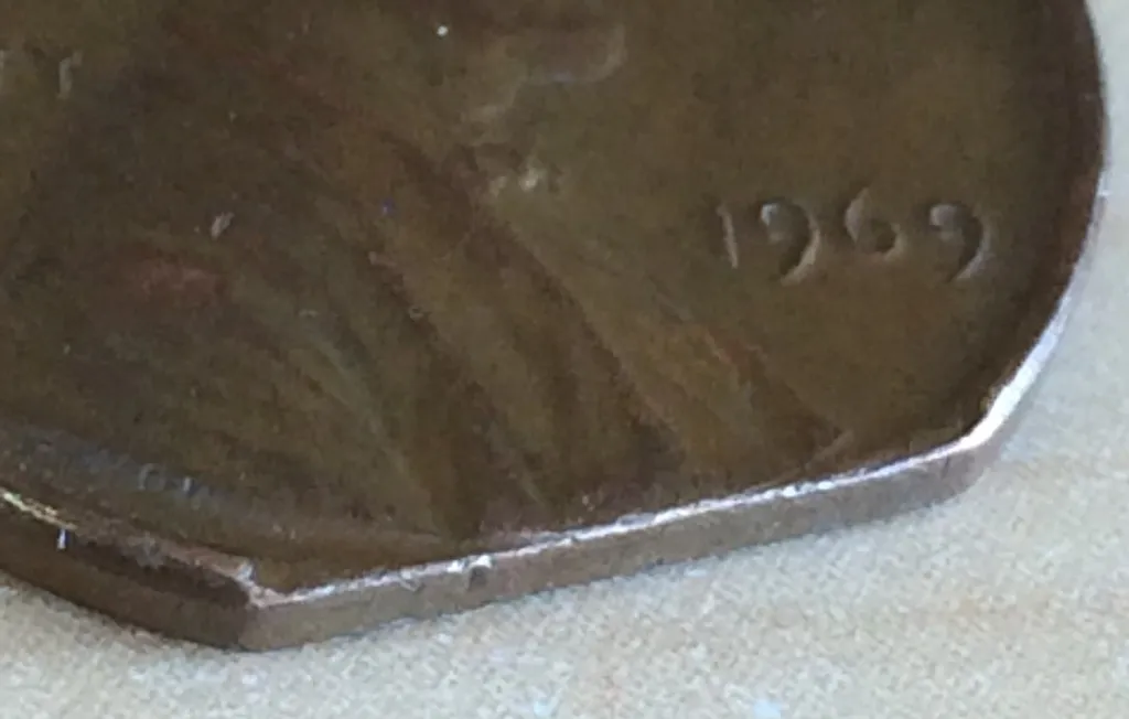 1969-Lincoln-Memorial-Cent---Clipped-Planchet-Or-PMD?