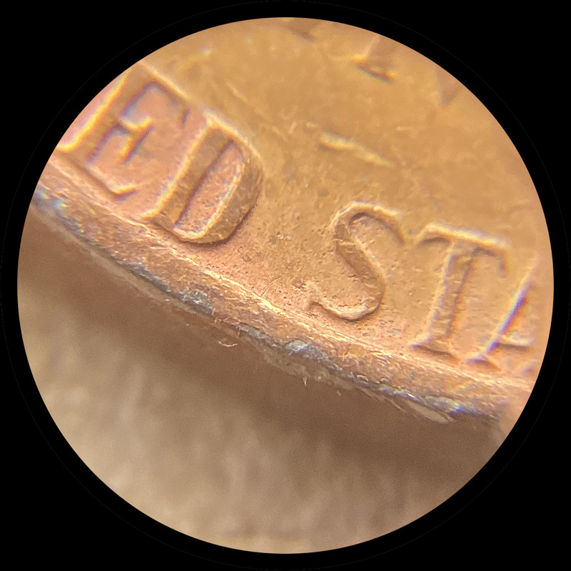 1977-Nickel-With-Large-Flaking-Copper-Patches.