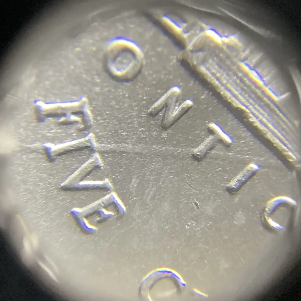 2023-P-Nickel-With-Long-Die-Dent.