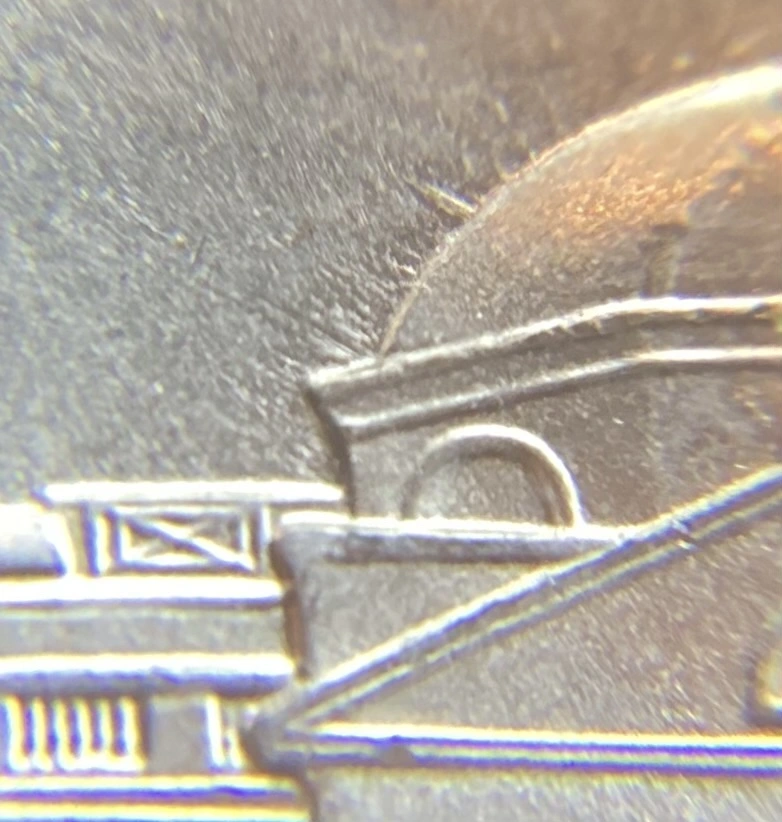 2021-P-Nickel-With-Feeder-Finger-Damage.