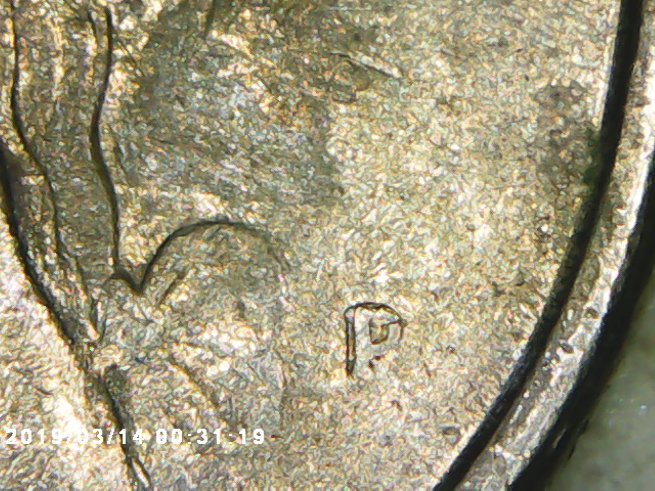 1991-Quarter-Dollar-With-Weird-Mint-Mark-And-Date