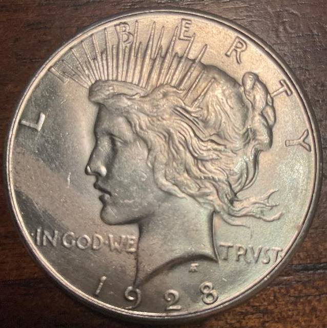 1928-S-Peace-Streak-On-Obverse