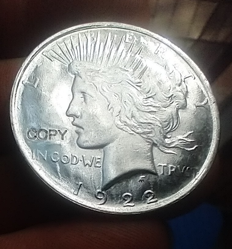 The-Word-Copy-Stped-In-My-1922-Peace-Dollar