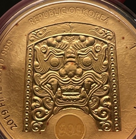 Red-Spotting-On-.999-Gold-Komsco-Round