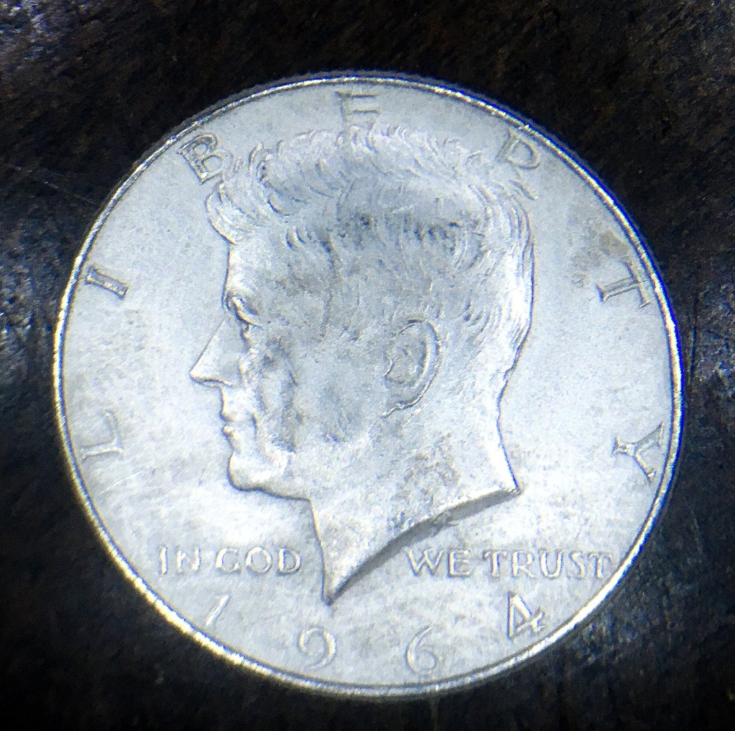 What-Kind-Of-1964-Kennedy-Half-Dollar-Looks-Frosty-All-Over-Like-This?