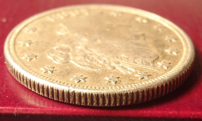 How-Does-One-Tell-If-A-Racketeer-Coin-Is-A-Real/Original-Racketeer-Coin?