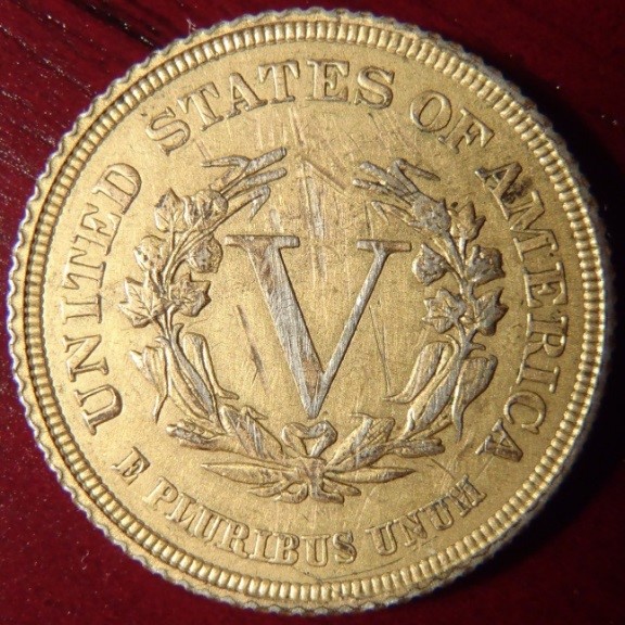 How-Does-One-Tell-If-A-Racketeer-Coin-Is-A-Real/Original-Racketeer-Coin?