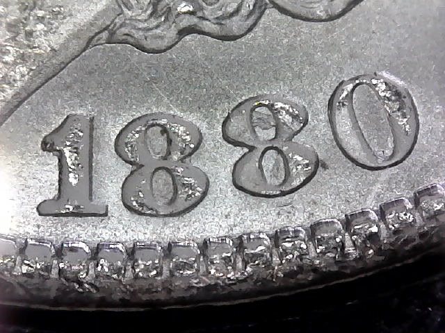 1880-Morgan-Dollar.-8-Over-7-?