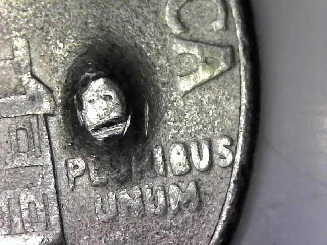1776-1976-D-Kennedy-Half.--Large-Raised-Areas-On-Both-Sides?