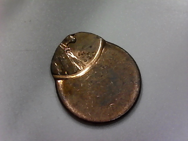 Three-Lincoln-Cents-Struck-Off-Center-And-One-?-Jewelry-Piece?