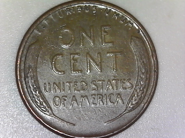 1957-D-What-Is-The-Raised-Chunk-Next-To-The-Mint-Mark?