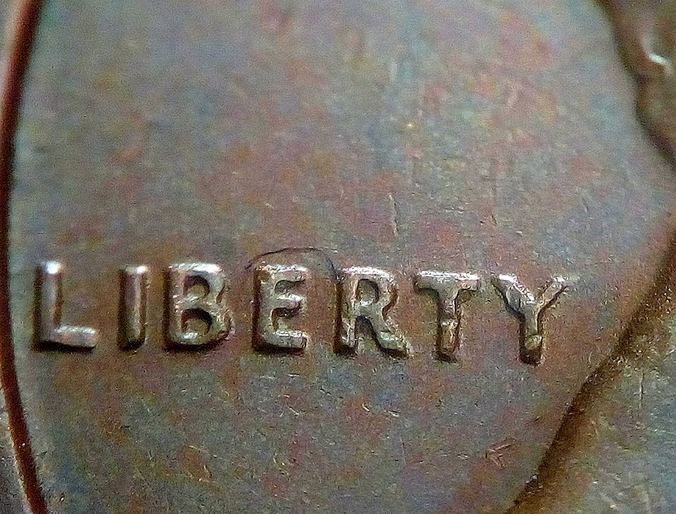 1969-S-Lincoln-Cent-With-Lamination-On-The-Reverse-Side-And-MD-Obverse-?