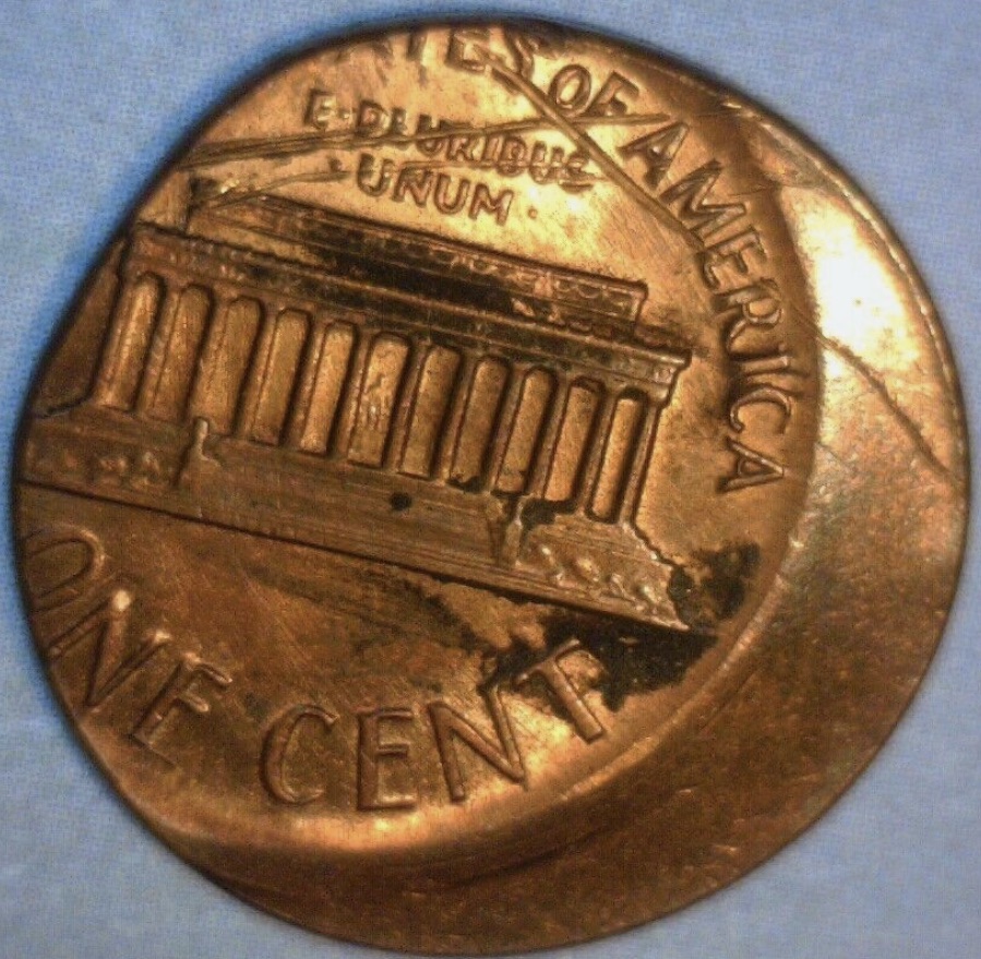 Help-With-1979-P-Lincoln-Cent-Struck-Through,-Planchet-Error,-Or?-Off-Center