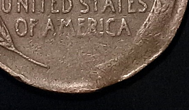 1945-Wheat-Penny.-Is-This-Damage-Or-Something-More?