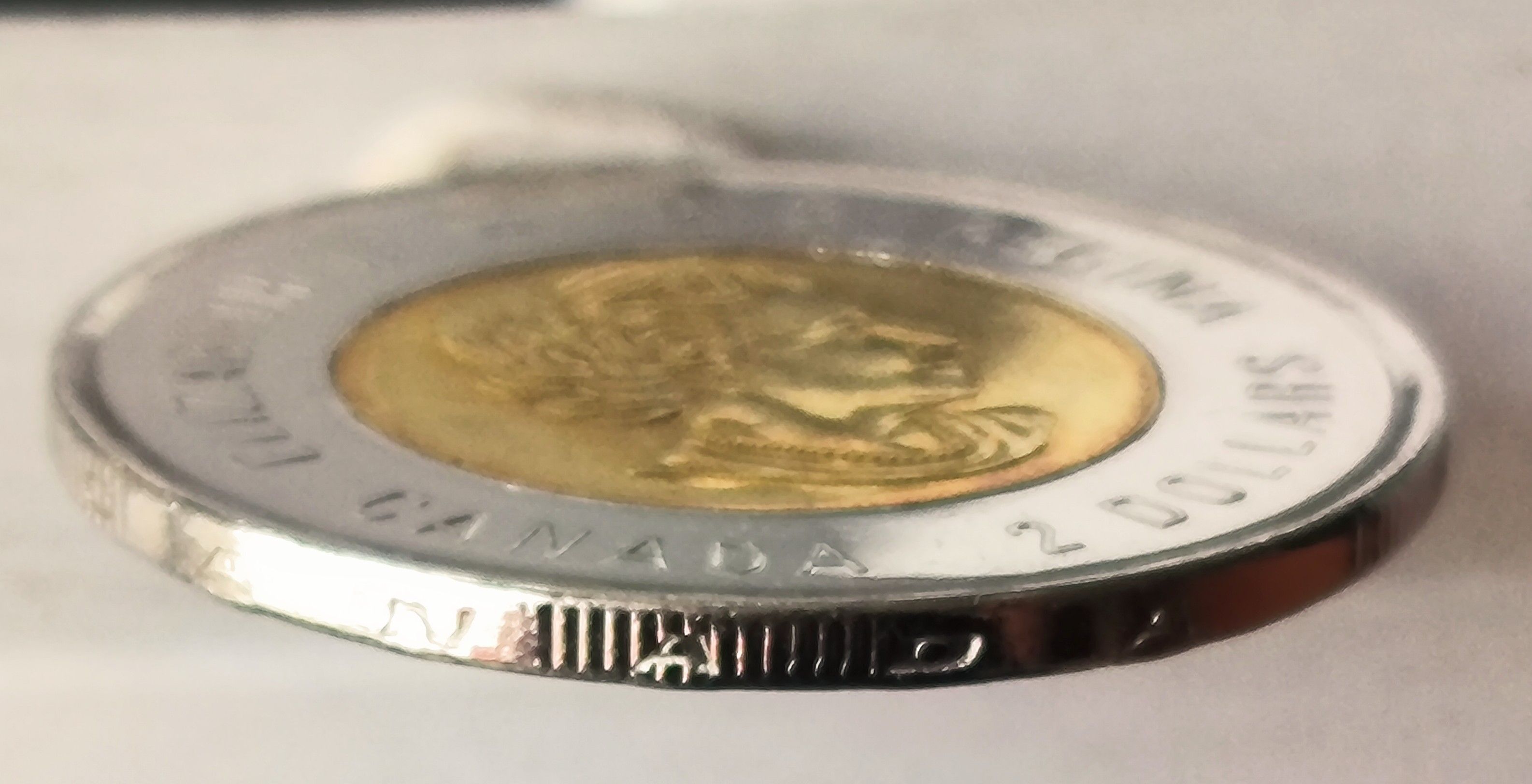 2018-Canadian-Toonie-Inverted-Security-Edge-Letter