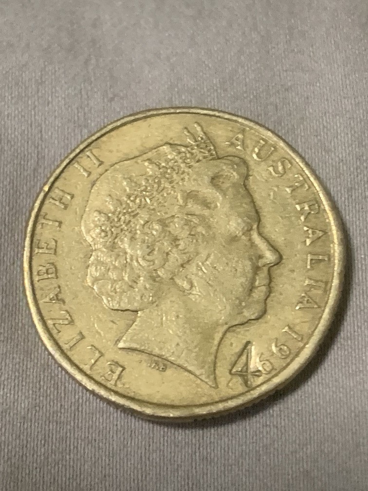 1999-Aust-1$-Coin-With-Stamped-...-4-...near-And-Over-The-Date-?