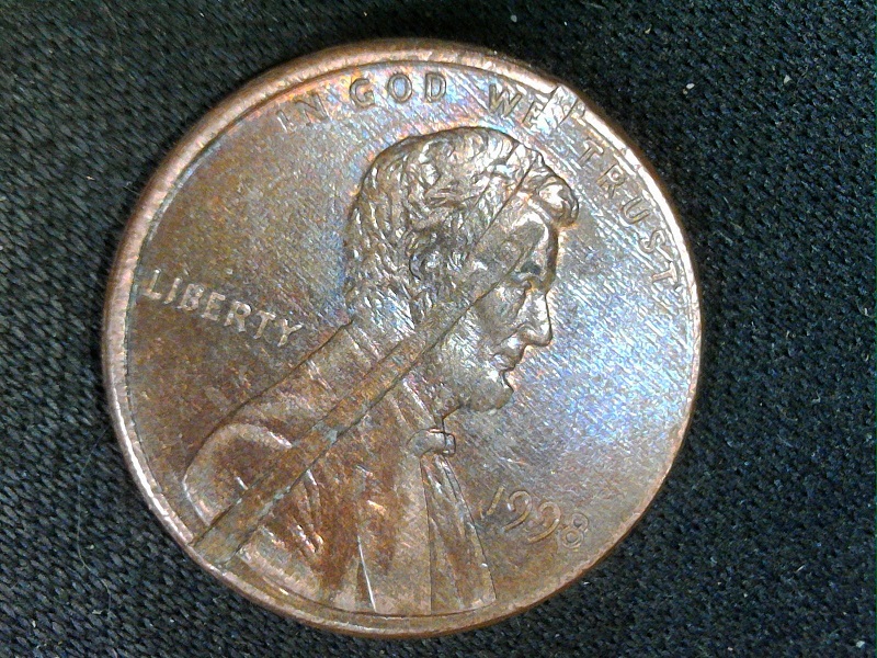 1998-P-Lincoln-Cent-With-Struck-Through-Planchet?-During-Blanking-Press?