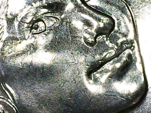 2002-D-Sacagawea-Dollar-From-Mint-Set-Error-Across-Sacagawea's-Face.-Is-It-A-Die-Crack-Or-Gouge?