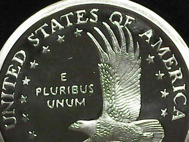 2003-S-Sacagawea-Dollar-Proof-Has-Damage-On-The-First-A-In-America.-Is-This-Grease-On-The-Die?