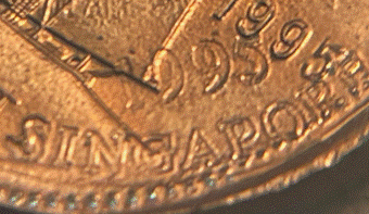 1995-Canadian-Dime-Stamped-On-A-1995-Singapore-Cent