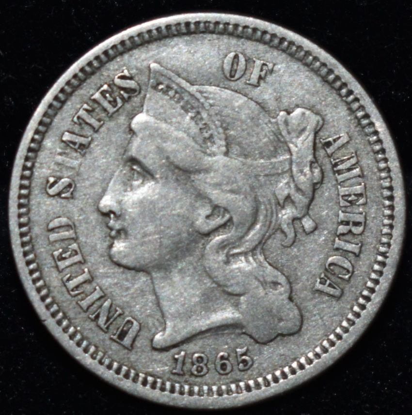 Extra-Metal-On-The-Reverse-Of-1865-Cn-3-Cent-Piece