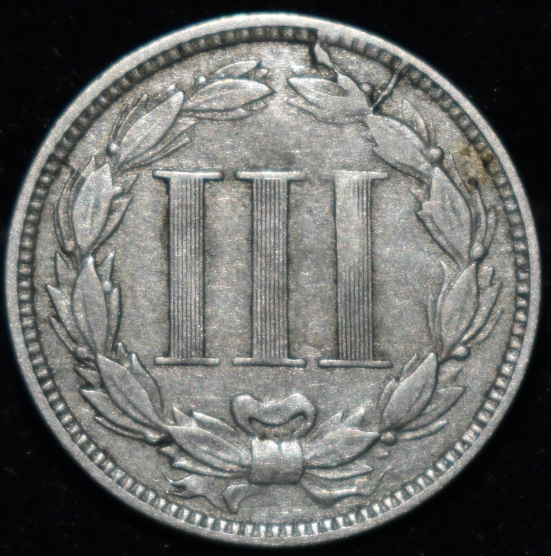 Extra-Metal-On-The-Reverse-Of-1865-Cn-3-Cent-Piece