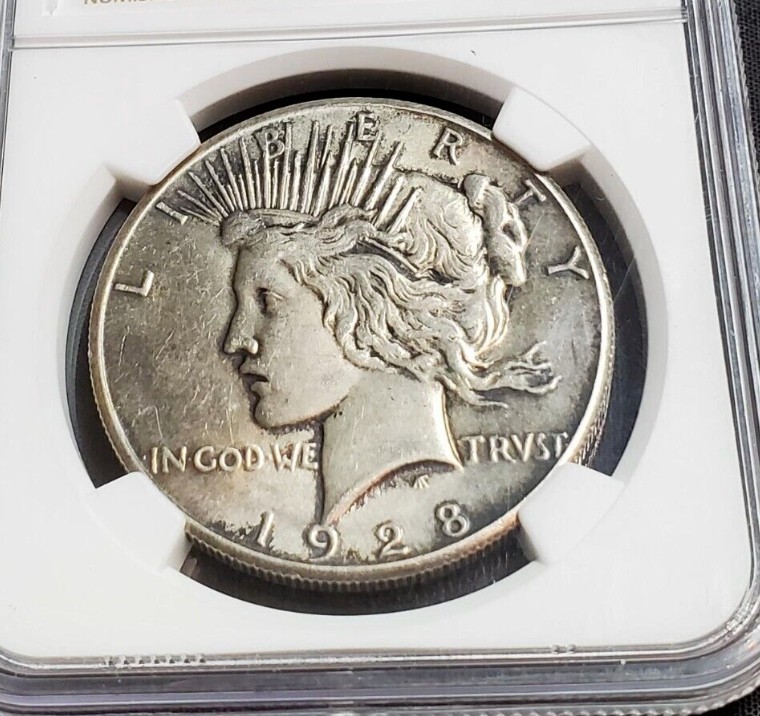 1928-P-Peace-Dollar-You-Vs.-NGC