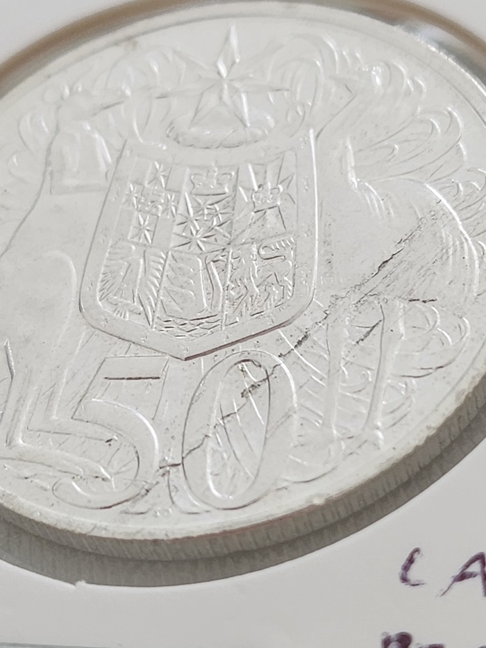 1966-Round-50-Cent-Lamination/Planchet-Flaw/Crack