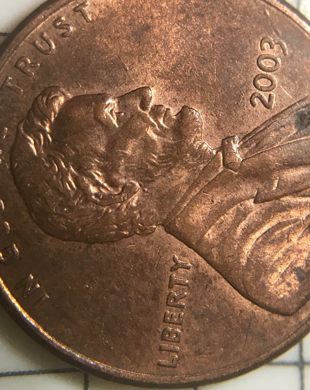 2003-Lincoln-Cent,-Die-Chip-Or-DDO-Of-The-Ear?
