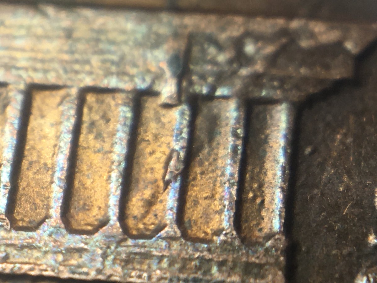 1984-D-Reverse-Strange-Raised-Line-Going-Across-Diagonally