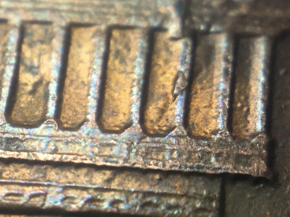 1984-D-Reverse-Strange-Raised-Line-Going-Across-Diagonally