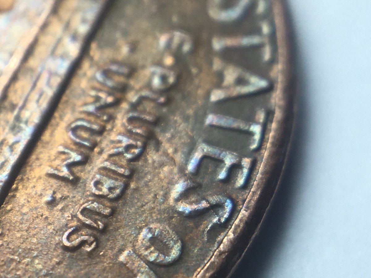 1984-D-Reverse-Strange-Raised-Line-Going-Across-Diagonally