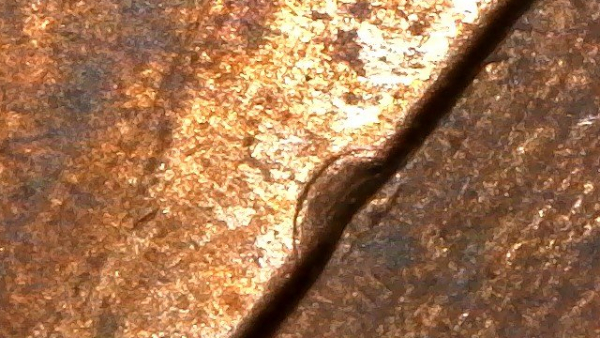 1981-LMC-With-Semi-Circular-Die-Crack-At-Bottom-Of-Memorial-Help-Please