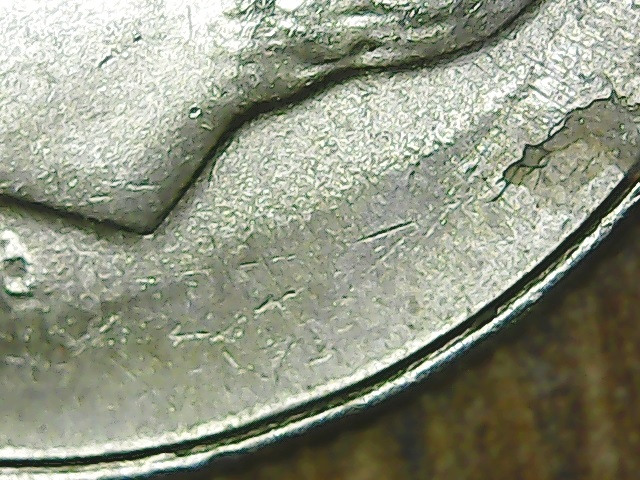 2015--P-Dime,--Obverse-Struck-By-Some-Other-Coin-Die?