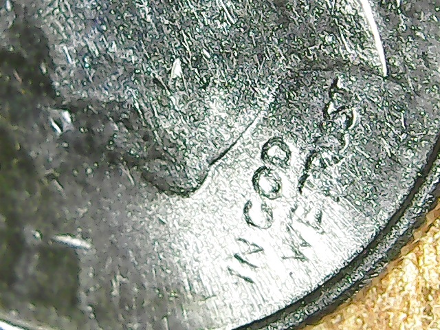 2015--P-Dime,--Obverse-Struck-By-Some-Other-Coin-Die?
