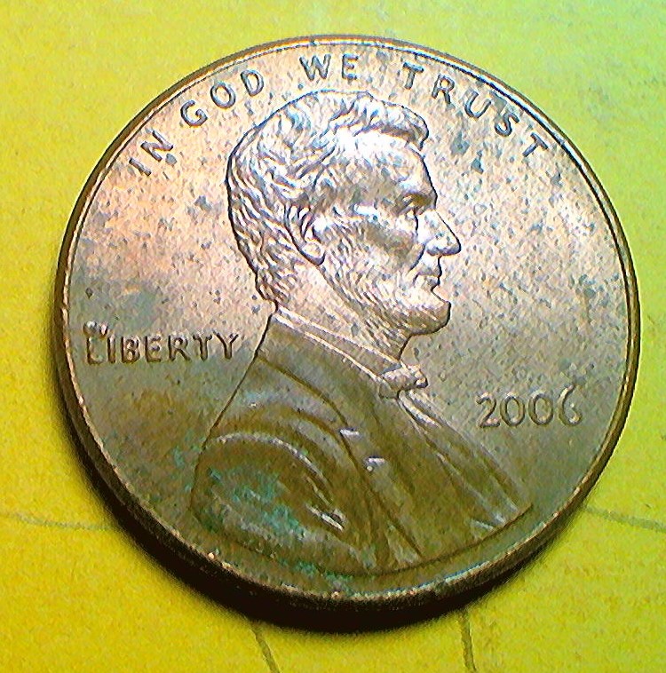 2006-Penny-With-Possible-Die-Chips-And-Blister-In-L-Obverse