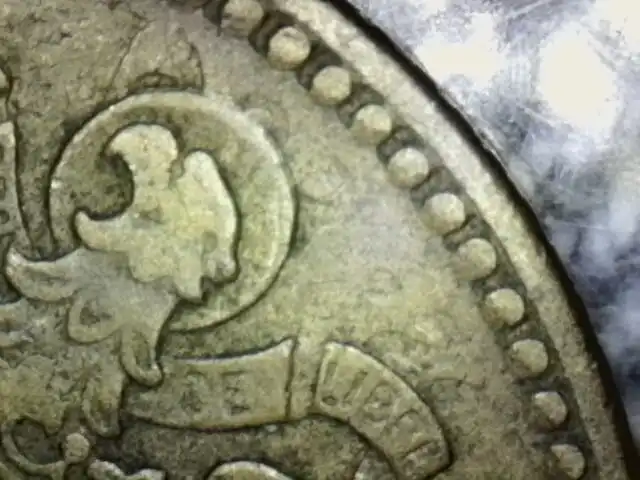 A-1962-Una-Peseta-Coin-That-Has-A-Strange-Marking/Overstrike-On-The-Reverse-Side-Of-The-Coin.