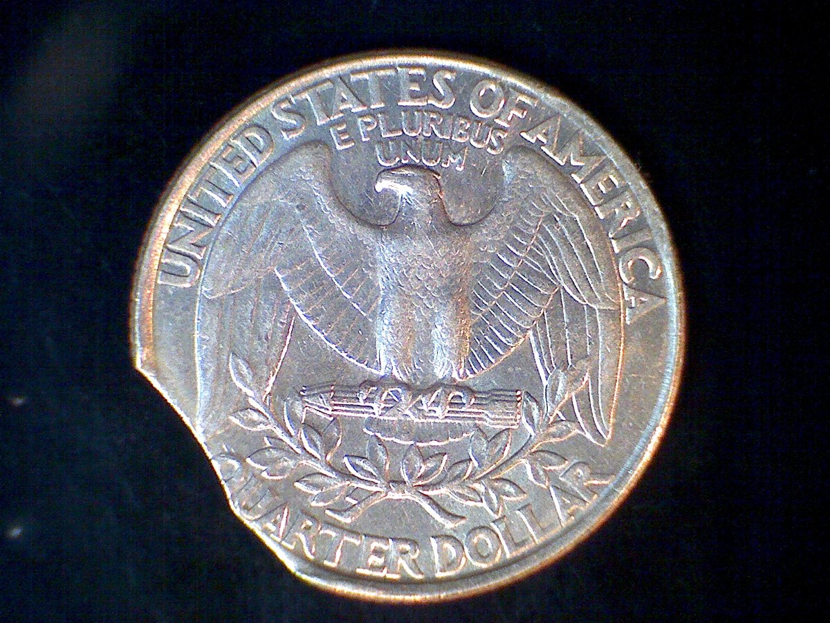 1996-Quarter,-Looks-Like-2-Curved-Clips-In-Same-Clip