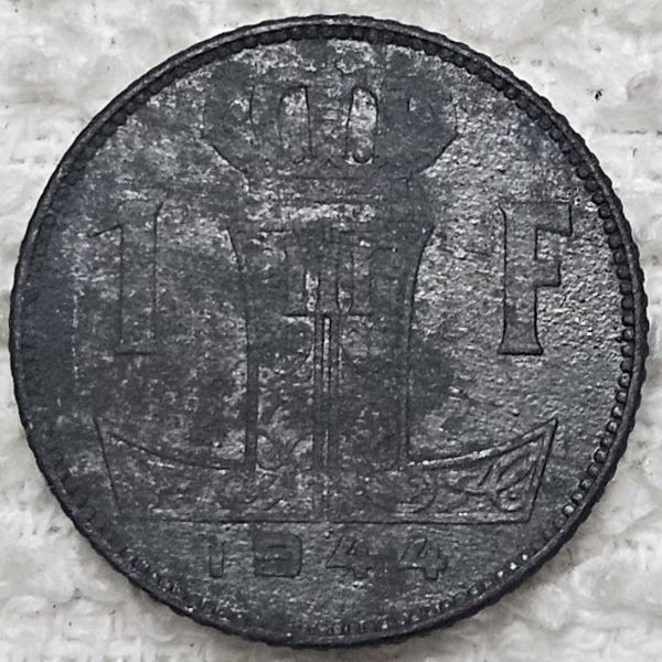 Attempting-A-Conservation-Of-A-Zinc-Belgium-1-Franc-Coin.