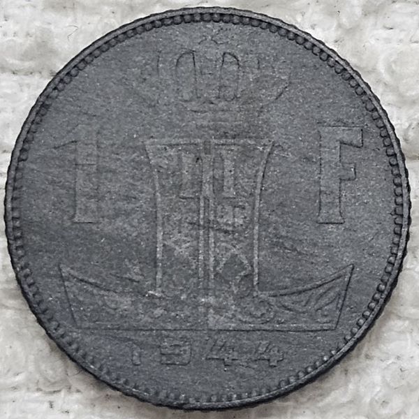 Attempting-A-Conservation-Of-A-Zinc-Belgium-1-Franc-Coin.